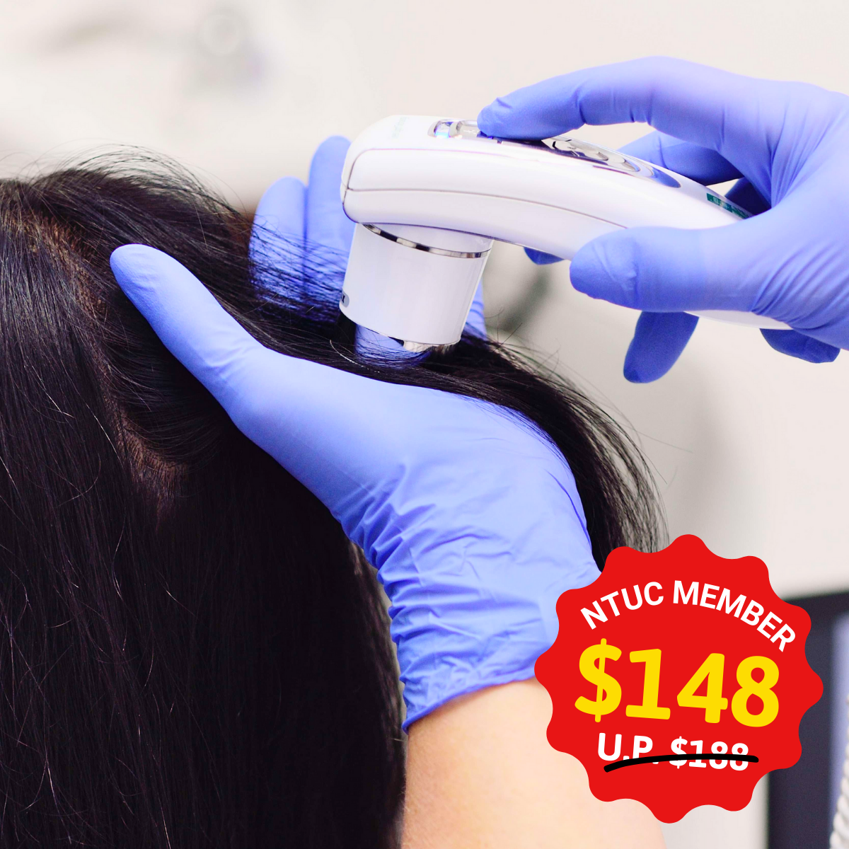 A stylist applying scalp treatment in a salon