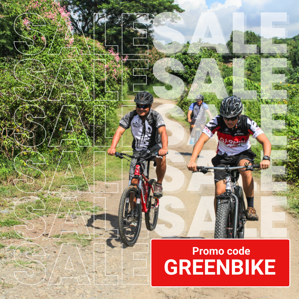Cyclists riding through lush greenery on a guided bike trail at Pulau Ubin, Singapore