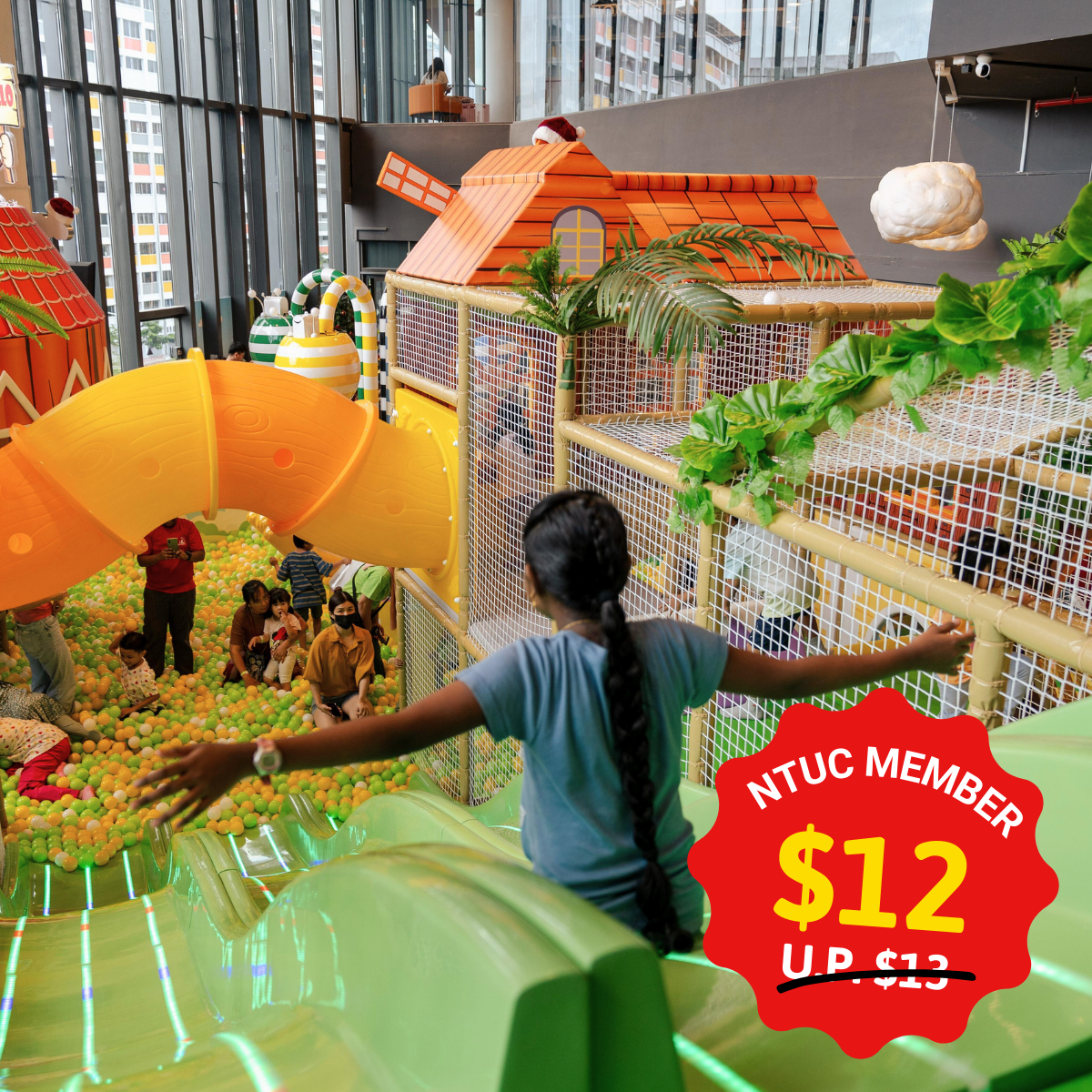 Kids playing in a jungle-themed indoor playground