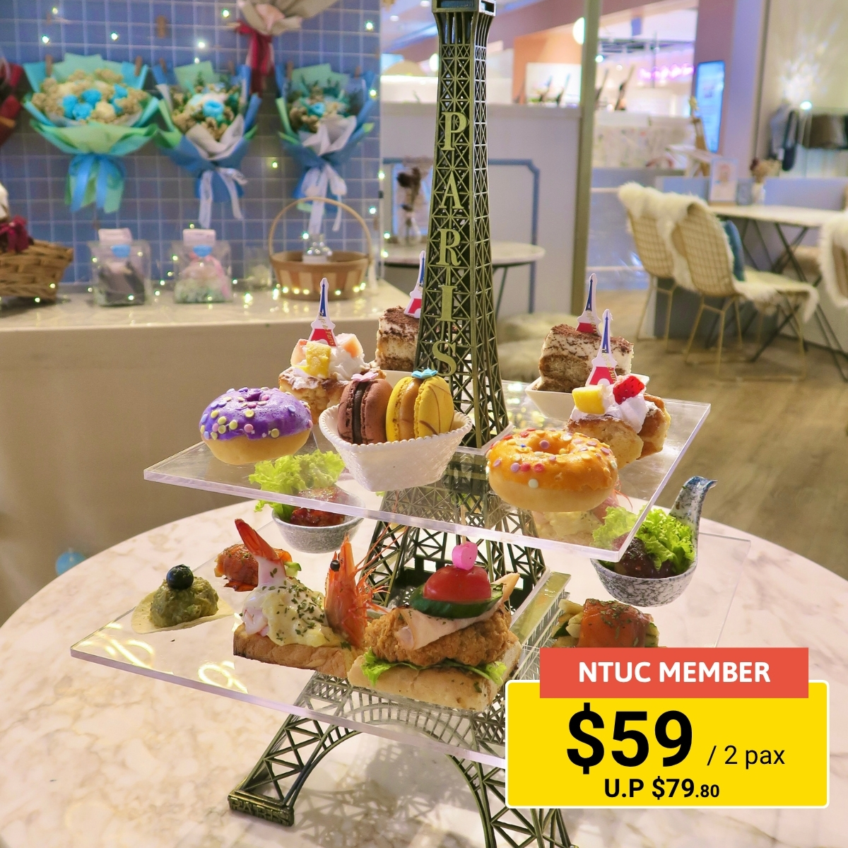 High tea session for two at Café De Paris with pastries and teas.